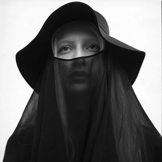 veiled woman